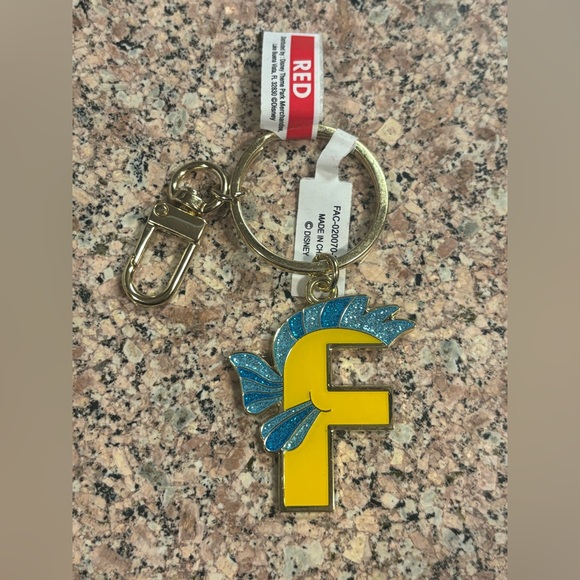 Disney Parks Flounder F Keychain/Bag Charm NWT - Picture 1 of 3